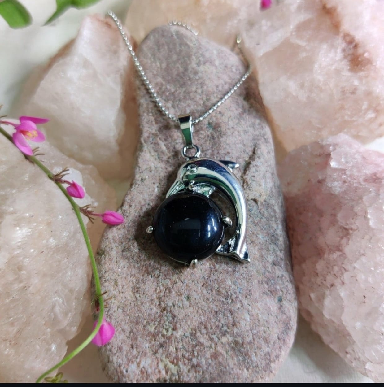 Dolphin Pendant with a Black Stone